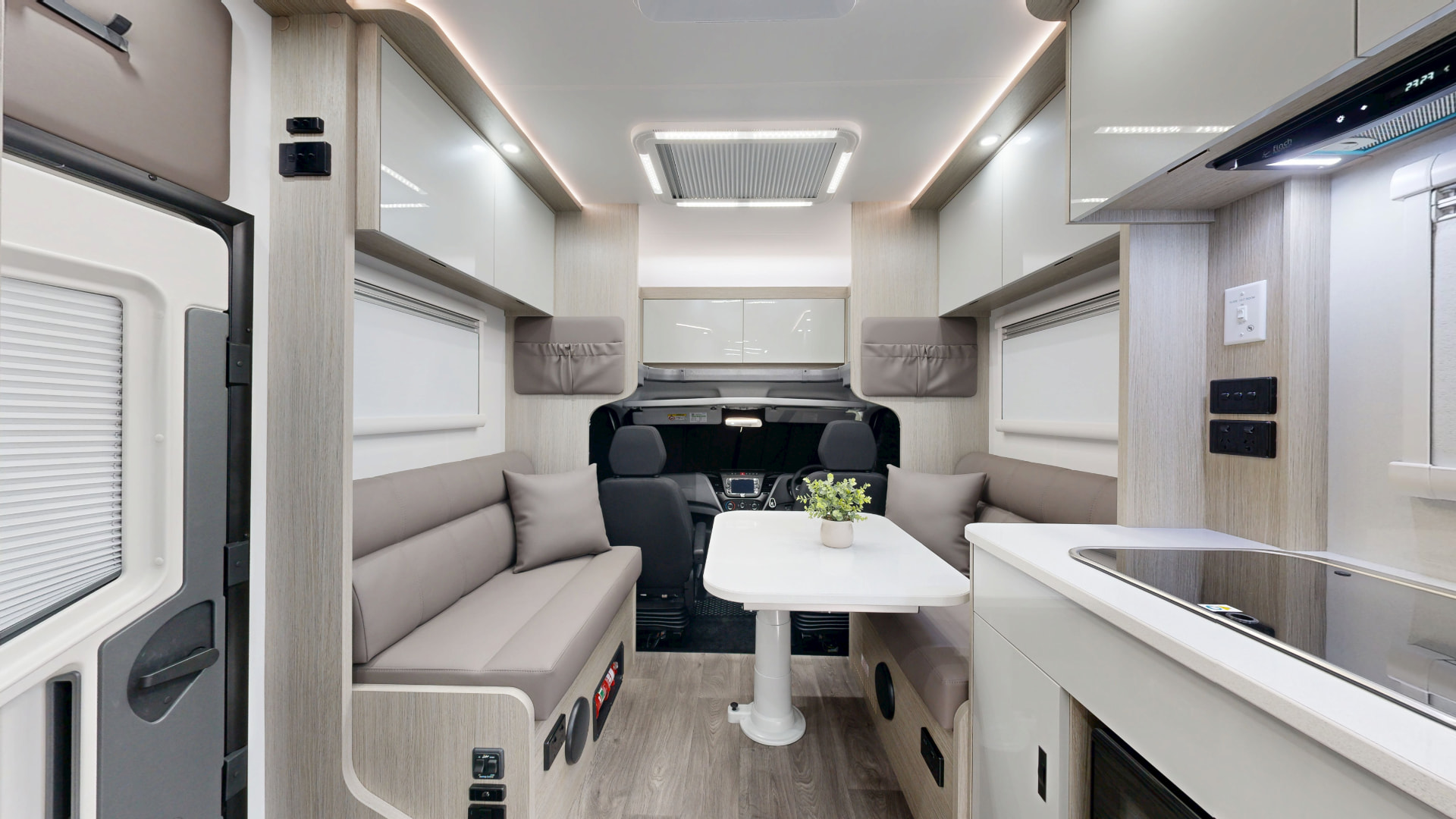 Supreme Motorhome interior lounge, dinette and kitchen